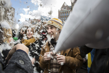 Amsterdam, The Netherlands, Noord Holland - Saturday, April 4 2015 - Pillow Fight on Dam Square as part of the international pillow fight day held in several cities in the worldのeditorial素材