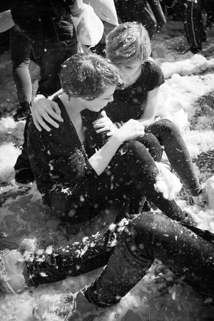 Amsterdam, The Netherlands, Noord Holland - Saturday, April 5 2014 - Pillow Fight on Dam Squareのeditorial素材