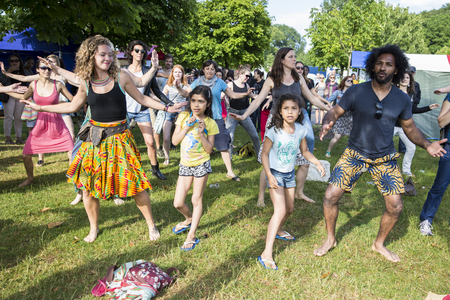 Amsterdam, The Netherlands - July, 5 2015: African dance workshop during Amsterdam Roots Open Air, a cultural festival held in Park Frankendael on 05/07/2015のeditorial素材
