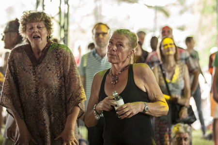 Amsterdam, The Netherlands - July, 5 2015: woman dancing in front of concert of Moroccan band Generation Taragalte, Cultural caravan for peace at Amsterdam Roots Open Air cultural festival held in Park Fraekendaelのeditorial素材