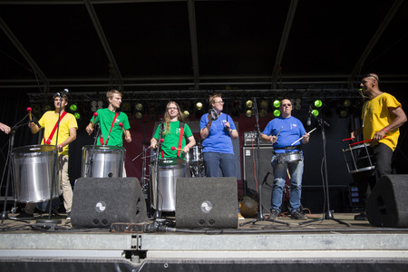 Amsterdam, The Netherlands - July, 3 2016: People performing a music and singing flashmob at Amsterdam Roots Open Air, free public cultural festival held in Oosterparkのeditorial素材