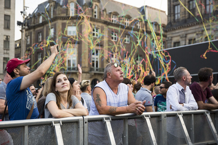 Amsterdam, the Netherlands Ã¢ï¿½ï¿½ July23, 2016: audience opening party on Dam square during Pink Saturday celebrations of the Gay EuroPrideのeditorial素材
