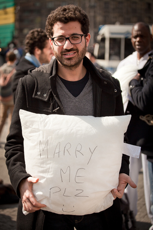 Amsterdam, The Netherlands, Noord Holland - Saturday, April 5 2014 - Pillow Fight on Dam Squareのeditorial素材