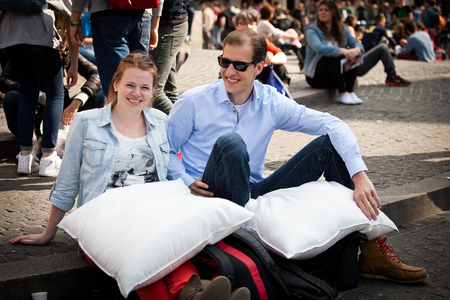 Amsterdam, The Netherlands, Noord Holland - Saturday, April 5 2014 - Pillow Fight on Dam Squareのeditorial素材