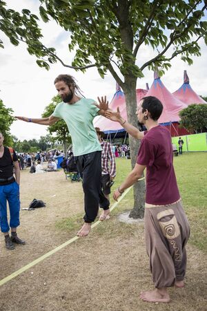 Amsterdam, The Netherlands - July, 5 2015: tightrope walking workshop during Amsterdam Roots Open...
