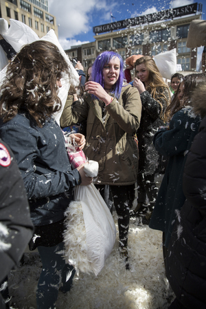 Amsterdam, The Netherlands, Noord Holland - Saturday, April 4 2015 - Pillow Fight on Dam Square as part of the international pillow fight day held in several cities in the worldのeditorial素材