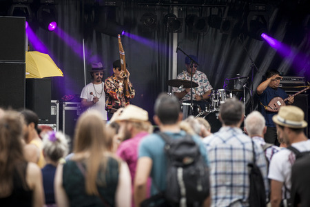 Amsterdam, The Netherlands - July, 5 2015: concert of Thai band The Paradise Bangkok Molam International Band during Amsterdam Roots Open Air, a cultural festival held in Park Frankendael on 05/07/2015のeditorial素材