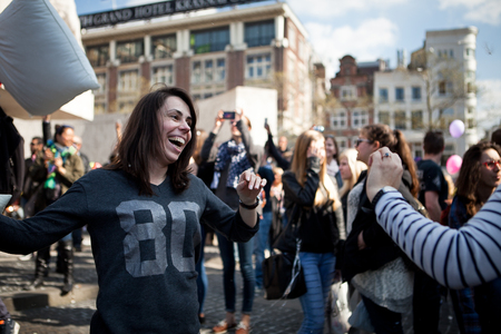Amsterdam, The Netherlands, Noord Holland - Saturday, April 5 2014 - Pillow Fight on Dam Squareのeditorial素材