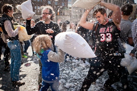 Amsterdam, The Netherlands, Noord Holland - Saturday, April 5 2014 - Pillow Fight on Dam Squareのeditorial素材
