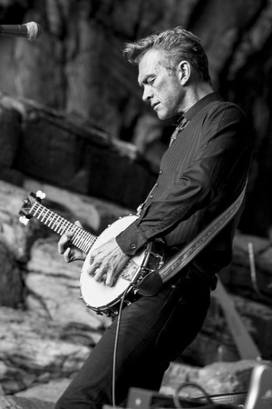 Traena, Norway - July 12 2014: during the concert of the Norwegian Singer Stein Torleif Bjella featuring Svartlamon Hardkor choir at cathedral cave of Kirkehelleren on Sana Isaland at the Traena music festivalのeditorial素材