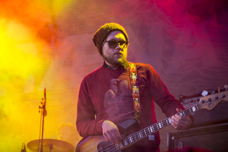 Traena, Norway - July 11 2014: during the concert of the Norwegian singer and guitarist Erlend Oyefeaturing the Icelandic band Hjalmarat the Traenafestival, music festival taking place on the small island of Traenaのeditorial素材