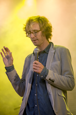 Traena, Norway - July 11 2014: during the concert of the Norwegian singer and guitarist Erlend Oyefeaturing the Icelandic band Hjalmarat the Traenafestival, music festival taking place on the small island of Traenaのeditorial素材