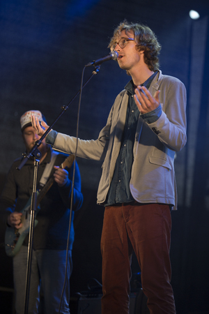 Traena, Norway - July 11 2014: during the concert of the Norwegian singer and guitarist Erlend Oyefeaturing the Icelandic band Hjalmarat the Traenafestival, music festival taking place on the small island of Traenaのeditorial素材