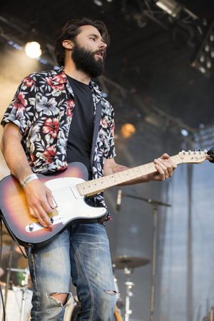 Traena, Norway - July 11 2014: during the concert of the Norwegian band Ida Maria  at the Traenafestival, music festival taking place on the small island of Traenaのeditorial素材