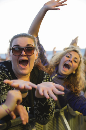 Traena, Norway - July 11 2014: people watching the concert of the Swedish pop-techno band Den Svenska Bjornstammen at the Traenafestival, music festival taking place on the small island of Traenaのeditorial素材