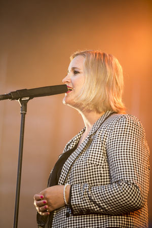 Traena, Norway - July 10 2013: during the concert of the Norwegian singer Hekla Stalstrenga at the Traenafestival, music festival taking place on the small island of Traenaのeditorial素材
