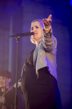 Traena, Norway - July 10 2013: during the concert of the Norwegian singer Hekla Stalstrenga at the Traenafestival, music festival taking place on the small island of Traenaのeditorial素材