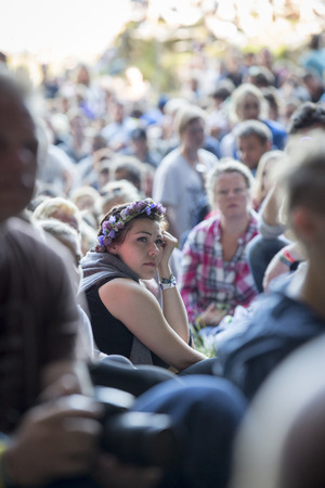 Traena, Norway - July 12 2014: during the concert of the Norwegian Singer Stein Torleif Bjella featuring Svartlamon Hardkor choir at cathedral cave of Kirkehelleren on Sana Isaland at the Traena music festivalのeditorial素材