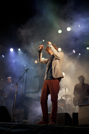 Traena, Norway - July 11 2014: during the concert of the Norwegian singer and guitarist Erlend Oyefeaturing the Icelandic band Hjalmarat the Traenafestival, music festival taking place on the small island of Traenaのeditorial素材