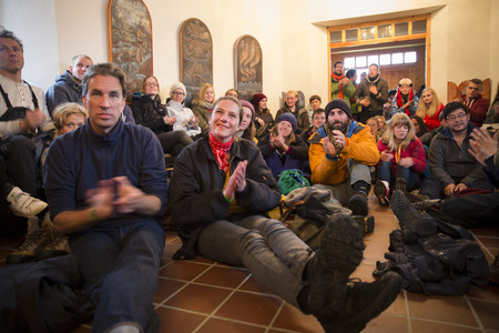 Traena, Norway - July 10 2015: people attenting to the reading of Lee, myself and I from by Wyndham Wallace, in the Traena chapel, at Traenafestival, music festival taking place on the small island of Traenaのeditorial素材