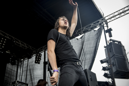 Traena, Norway - July 9 2015: concert of Norwegian rock band Carnival Kids at the Traenafestival, music festival taking place on the small island of Traenaのeditorial素材