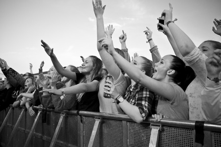 Traena, Norway - July 11 2014: people watching the concert of the Swedish pop-techno band Den...