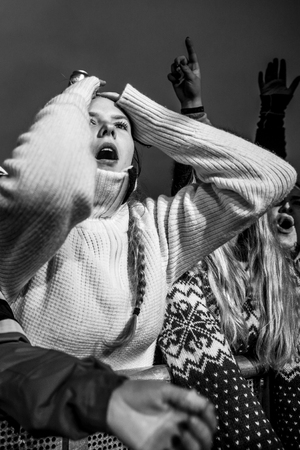 Traena, Norway - July 9 2015: fans cheering with arms up at concert of Norwegian rock band OnklP & De Fjerne Slektningene at Traenafestival, music festival taking place on the small island of Traenaのeditorial素材