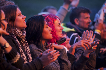 Traena, Norway - July 08, 2016: audience cheering at concert of Norwegian folk and rock band Violet Road at Traenafestival, music festival taking place on the small island of Traena in Norwayのeditorial素材