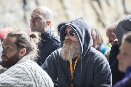 Traena, Norway - July 11 2015: audience at concert of Norwegian singer Anneli Drecker in Kirkehelleren cathedral cave on Sanna Island, at Traenafestival, music festival taking place on the small island of Traenaのeditorial素材