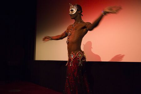 Amsterdam, The Netherlands - August 20 2016: Male belly dancer performing before the film Toz Bezi (Dust Cloth) during World Cinema Amsterdam, a world film festival held from 18 to 27/08/2016のeditorial素材