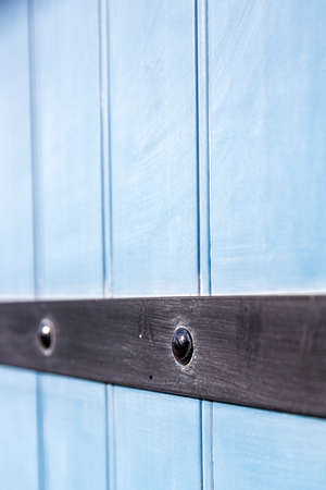close up on French pale blue wooden window shutters