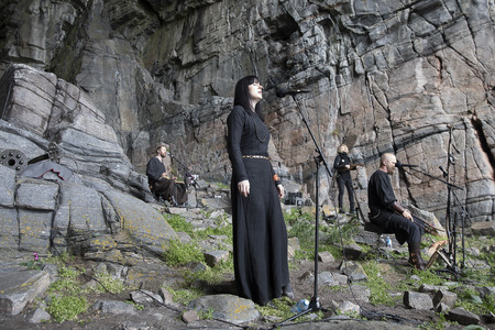 Traena, Norway - July 8 2017: concert of Norwegian band Wardruna at cathedral cave Kirkehelleren on Sanna Island, at Traenafestival, music festival taking place on the small island of Traena.のeditorial素材