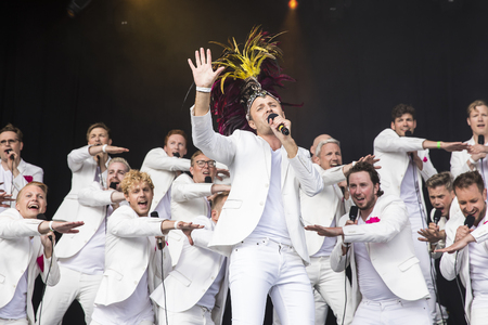 Traena, Norway - July 7 2017: concert of Norwegian gay choir Oslo Fagottkor at Traenafestival, music festival taking place on the small island of Traenaのeditorial素材