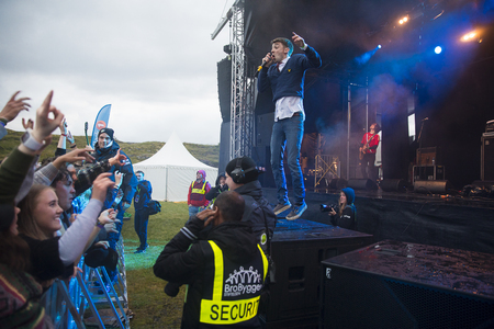 Traena, Norway - July 6 2017: concert of Norwegian punk rock band Honningbarna at Traenafestival, music festival taking place on the small island of Traenaのeditorial素材