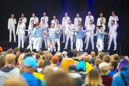 Traena, Norway - July 7 2017: concert of Norwegian gay choir Oslo Fagottkor at Traenafestival, music festival taking place on the small island of Traenaのeditorial素材