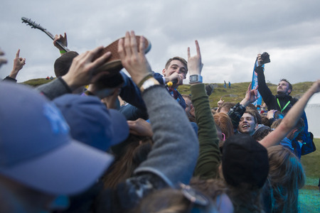 Traena, Norway - July 6 2017: singer of Norwegian punk rock band Honningbarna crowd surfing at Traenafestival, music festival taking place on the small island of Traenaのeditorial素材