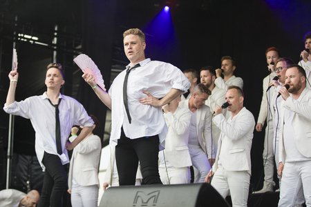 Traena, Norway - July 7 2017: concert of Norwegian gay choir Oslo Fagottkor at Traenafestival, music festival taking place on the small island of Traenaのeditorial素材
