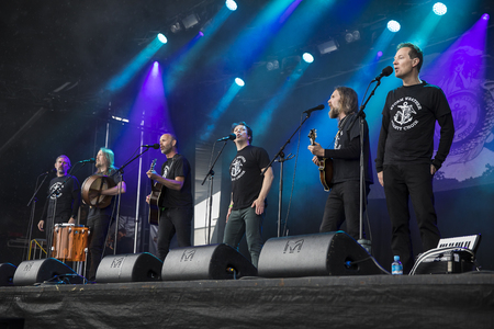 Traena, Norway - July 8 2017: concert of Norwegian shanties choir band Storm Weather Shanty Choir at Traenafestival, music festival taking place on the small island of Traenaのeditorial素材