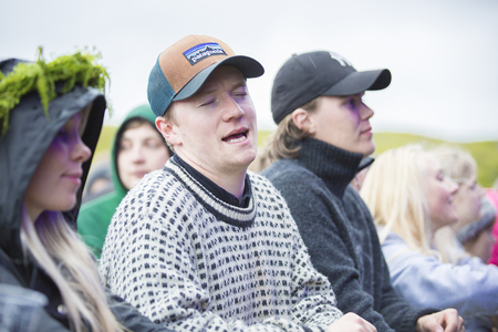 raena, Norway - July 6 2017: audience cheering at concert of Norwegian reggae ska band QueDuhSka at Traenafestival, music festival taking place on the small island of Traenaのeditorial素材