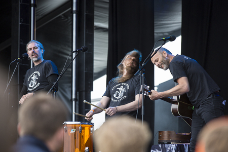 Traena, Norway - July 8 2017: concert of Norwegian shanties choir band Storm Weather Shanty Choir at Traenafestival, music festival taking place on the small island of Traenaのeditorial素材