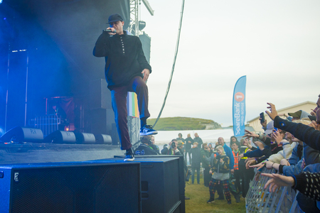 Traena, Norway - July 7 2017: concert of Norwegian rap band Sushi X Kobe at Traenafestival, music festival taking place on the small island of Traenaのeditorial素材