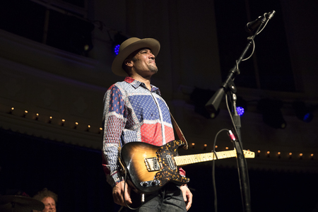 Amsterdam, The Netherlands - 9 April 2018: Concert of American singer and guitarist Ben Harper and bluesman and harmonica player Charlie Musselwhite in Paradiso Amsterdam.のeditorial素材
