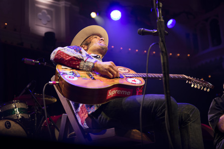 Amsterdam, The Netherlands - 9 April 2018: Concert of American singer and guitarist Ben Harper and bluesman and harmonica player Charlie Musselwhite in Paradiso Amsterdam.のeditorial素材