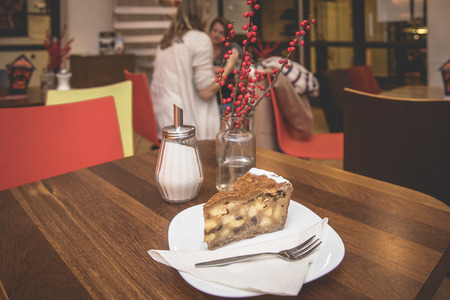 plate with a delicious piece of Dutch apple pieの写真素材