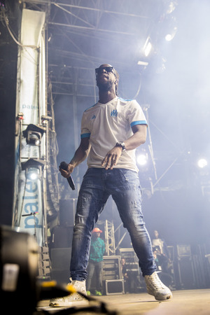 Nyon, Switzerland - 27 July 2019 : concert of French rap singer Youssouphaのeditorial素材