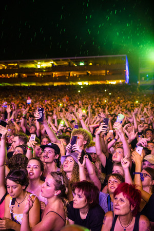 Nyon, Switzerland - 25 July 2019 : crowd od audience singing and cheering in front of concert of  French rap singer Lomepalのeditorial素材