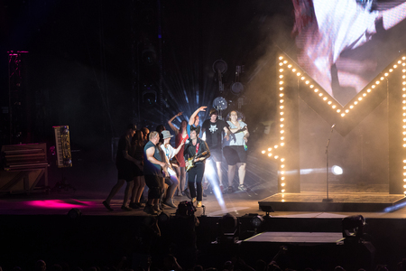 Nyon, Switzerland - 24 July 2019 :  general view on the main stage with crowd of audience at concert of extravagant French singer-songwriter and guitarist Matthieu Chedid called âM-のeditorial素材