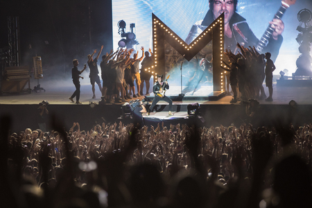Nyon, Switzerland - 24 July 2019 :  general view on the main stage with crowd of audience at concert of extravagant French singer-songwriter and guitarist Matthieu Chedid called âM-のeditorial素材