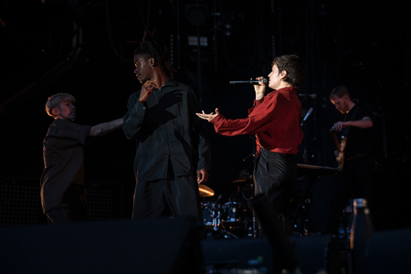 Nyon, Switzerland - 23 July 2019: Trumpeter in the pit playing in front of cheering crowd of fans during concert of Canadian rock band from Quebec Les Cowboys Fringants at Paleo Festivalのeditorial素材