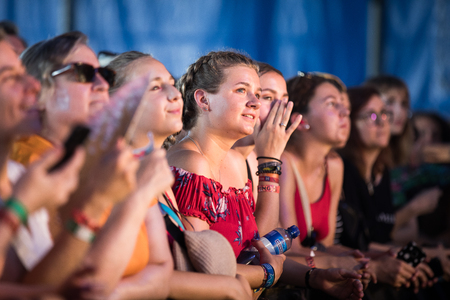 Nyon, Switzerland - 24 July 2019 : young people cheering in the audience at concert of Belgian indie rock singer Tamino at paleo festivalのeditorial素材